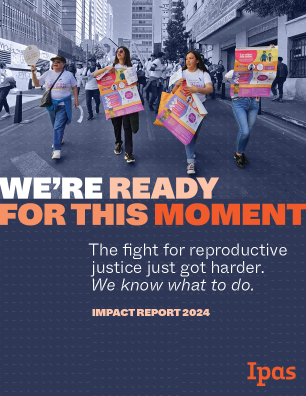 A group of people march on a street holding signs supporting reproductive justice. Text on the image reads "We're ready for this moment. The fight for reproductive justice just got harder. We know what to do. Impact Report 2024." The Ipas logo is at the bottom.